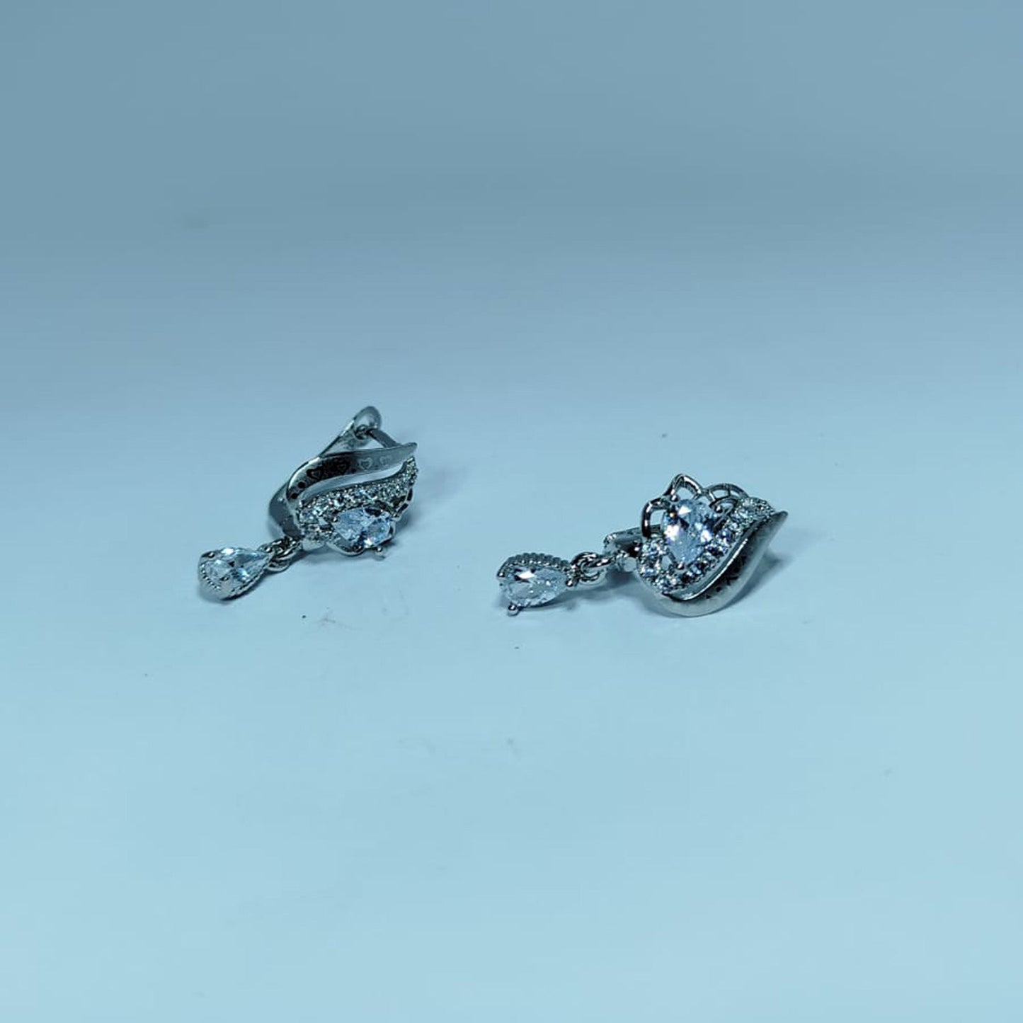 Sterling Silver Aqua-Blue Floral Stud Earrings – Elegant Flower Motif