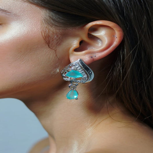 Sterling Silver Aqua-Blue Floral Stud Earrings – Elegant Flower Motif