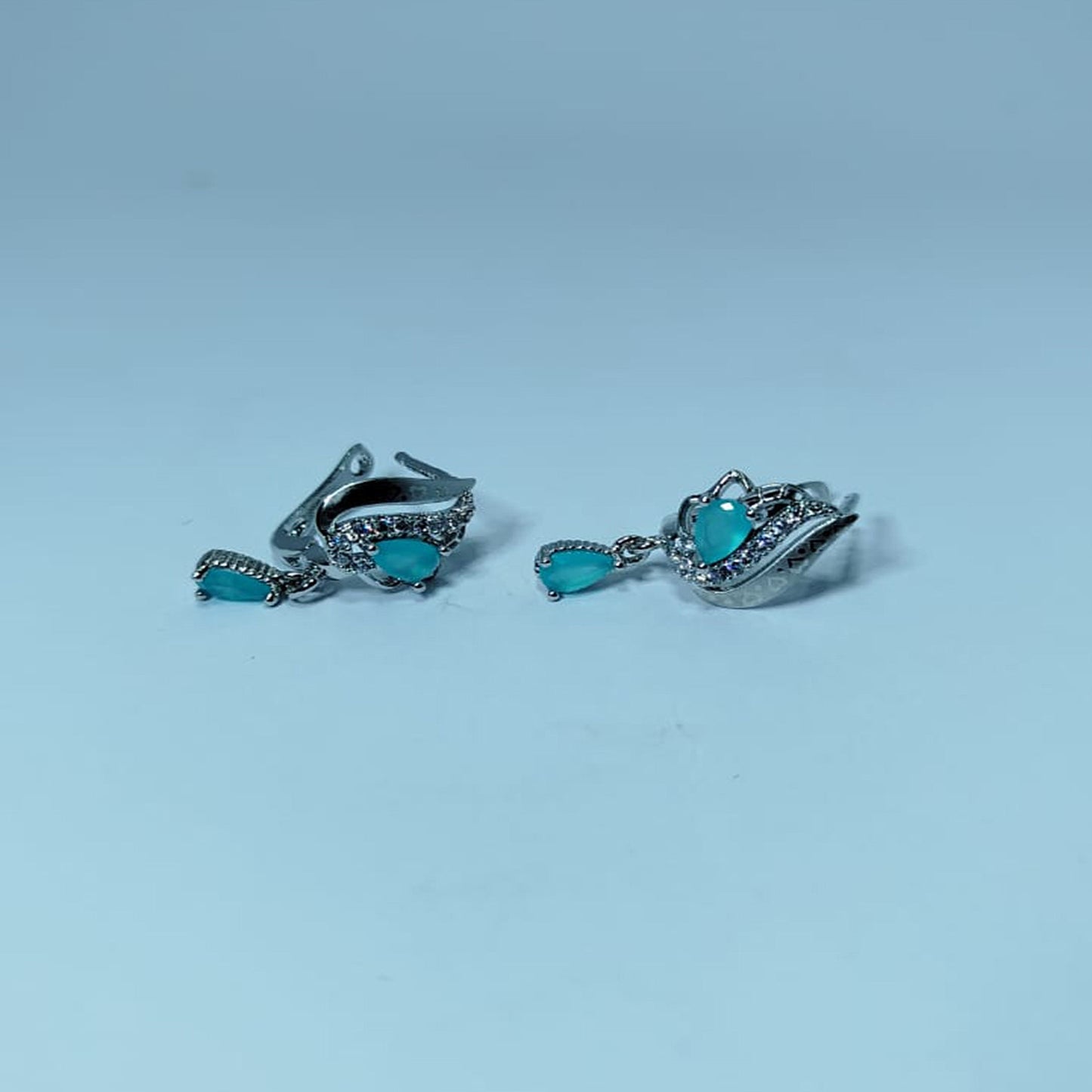 Sterling Silver Aqua-Blue Floral Stud Earrings – Elegant Flower Motif