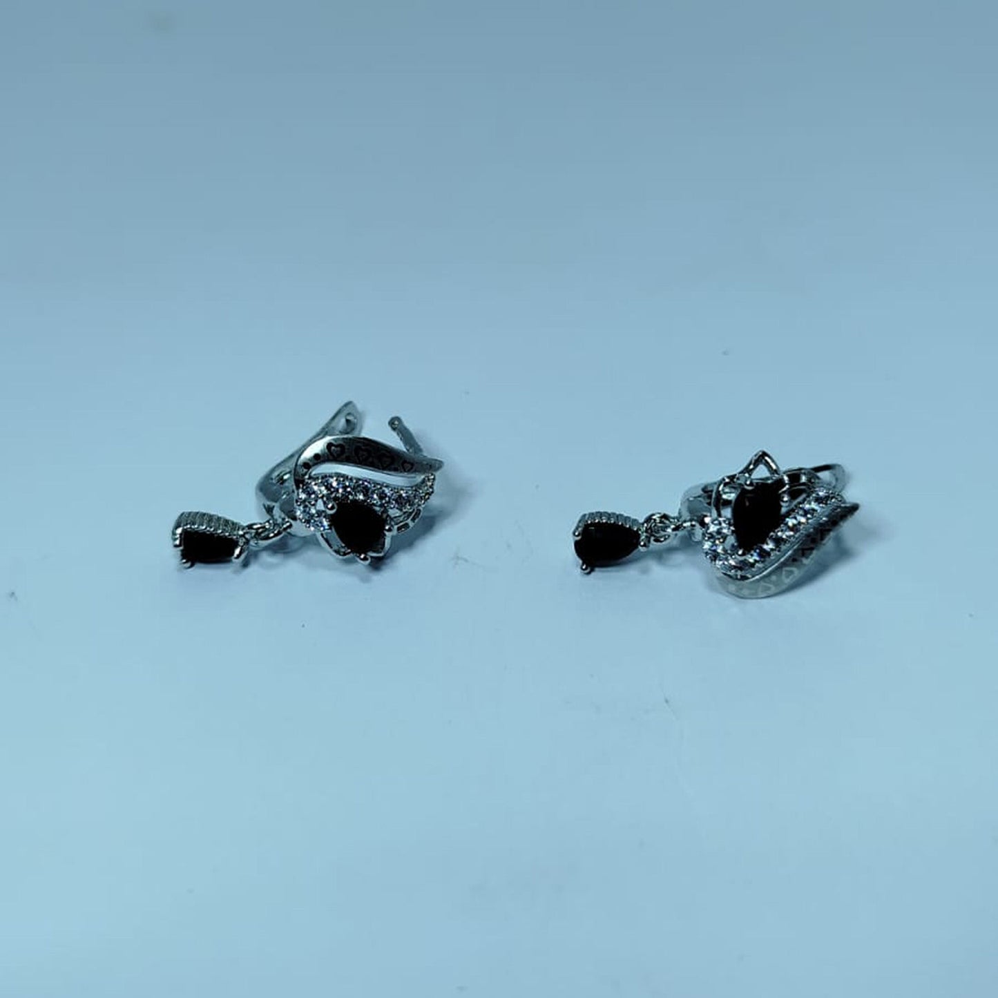 Sterling Silver Aqua-Blue Floral Stud Earrings – Elegant Flower Motif