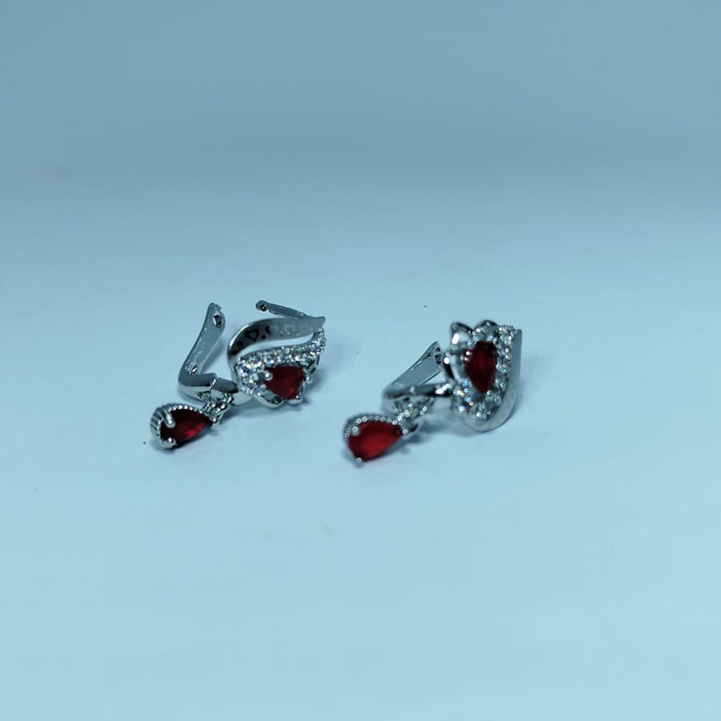 Sterling Silver Aqua-Blue Floral Stud Earrings – Elegant Flower Motif