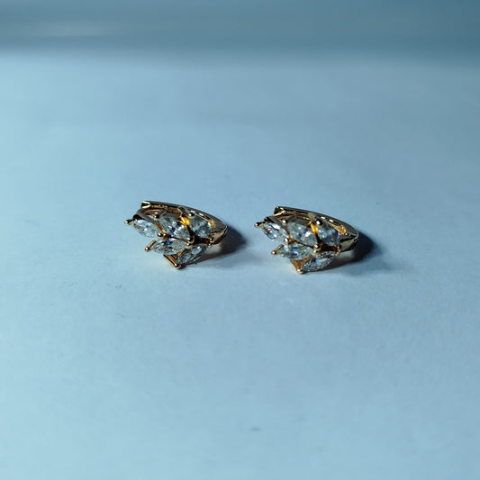 Crafted with meticulous gold-plated and white diamond earrings